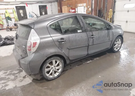 2014 Toyota Prius C Four z USA, uszkodzony, nr VIN JTDKDTB36E1064292